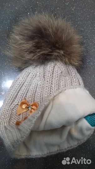 Новая зимняя шапка с помпоном из натур. меха енота