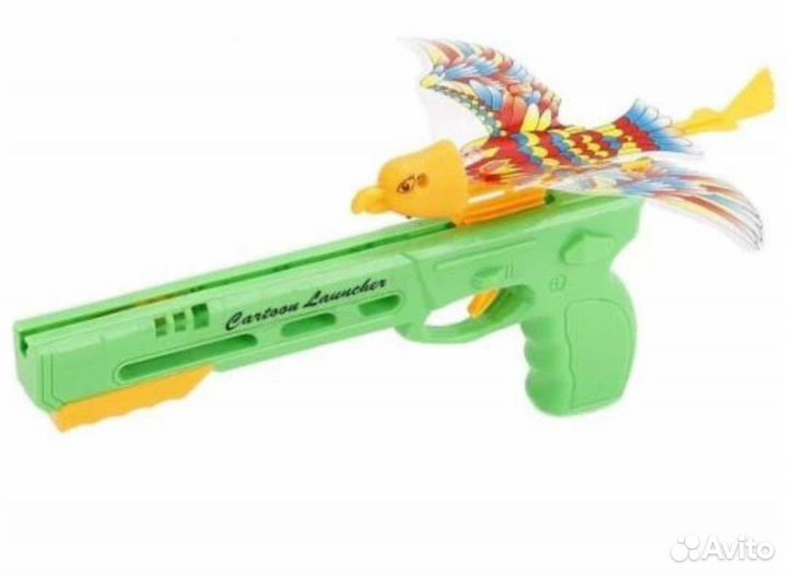 Пистолет игруш. стреляет птичкой(птица светится)