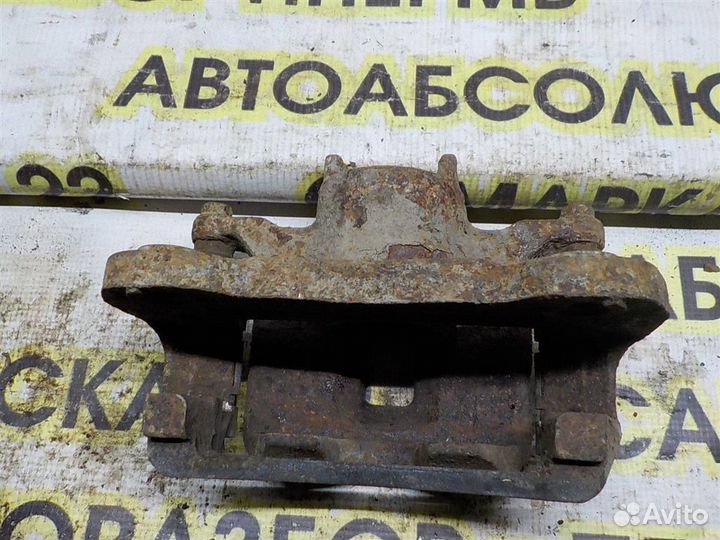 Суппорт передний левый Mitsubishi L200 (KB) 2006