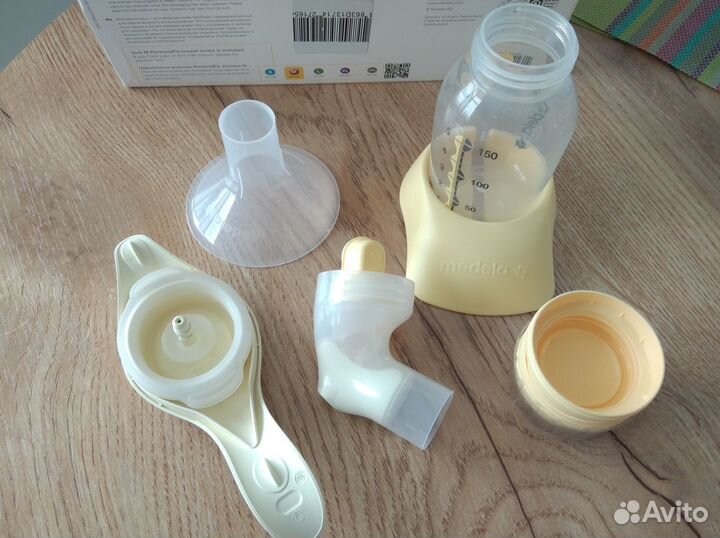 Ручной молокоотсос medela, бутылочка calma