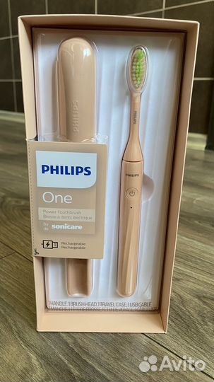 Электрическая зубная щетка Philips