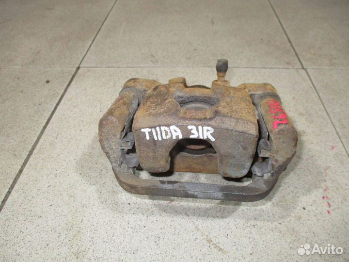 Суппорт задний правый Nissan Tiida (C11)