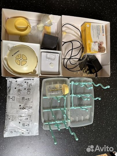 Молокоотсос medela электрический новый