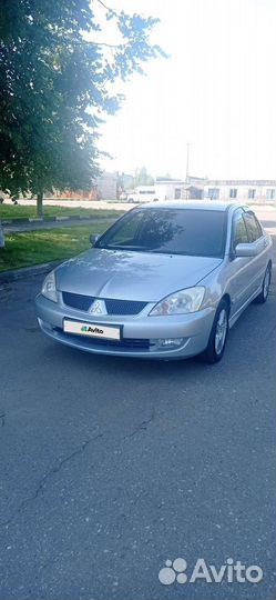 Mitsubishi Lancer 1.6 МТ, 2006, 294 335 км