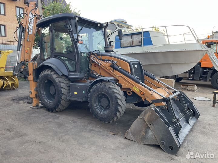 Машинист экскаватора погрузчика case 570ST