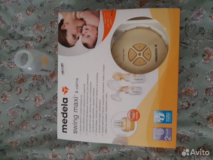 Молокоотсос электрический medela swing maxi