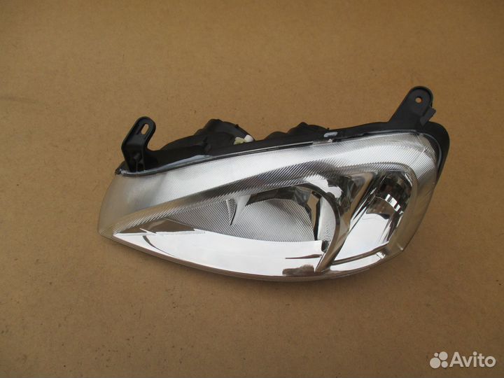 Фара левая Opel Corsa C