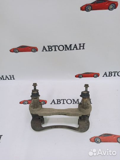 Скоба суппорта переднего Nissan Qashqai (J10)