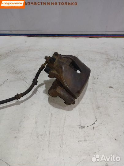 Суппорт тормозной передний правый Opel Astra