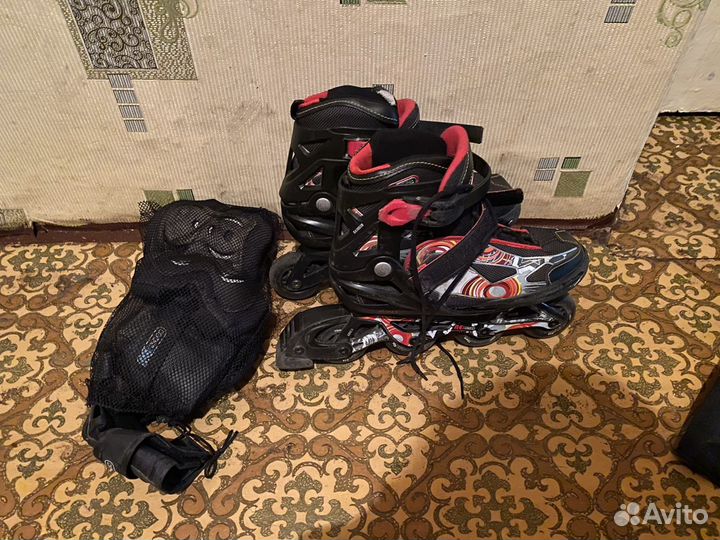 Роликовые коньки