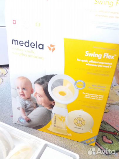Молокоотсос medela электрический новый