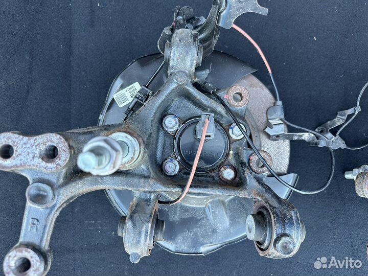 Задний кулак Toyota Corolla e210