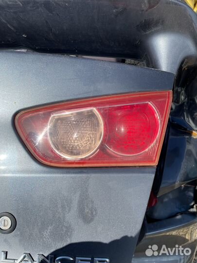 Mitsubishi lancer 10 фонарь в крышку багажника