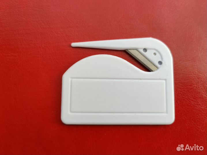 Нож для распаковки багажа