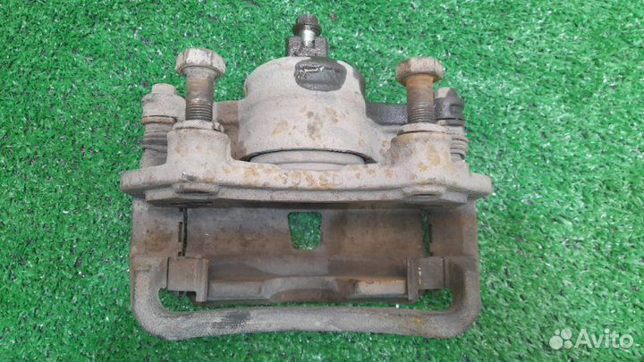 Суппорт передний левый Nissan Almera Classic 1.6