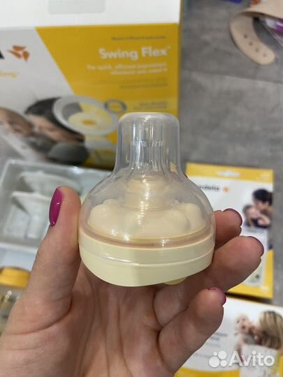 Молокоотсос medela swing flex электрический