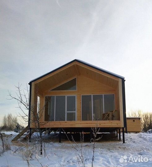 Каркасный дом с мансардой и террасой под ключ