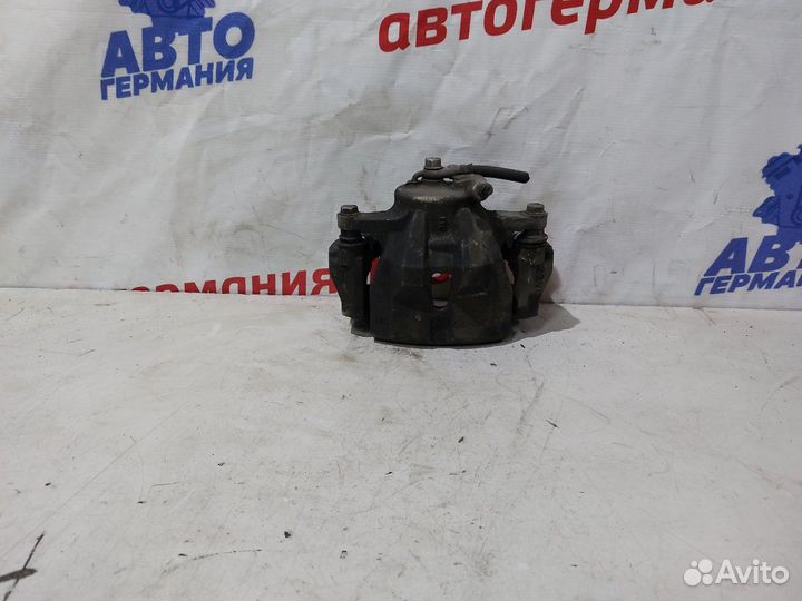 Суппорт тормозной передний левый Toyota Corolla