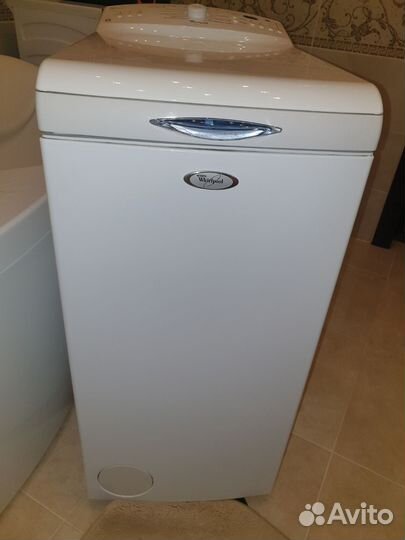 Стиральная машина с вертикальной загрузкой