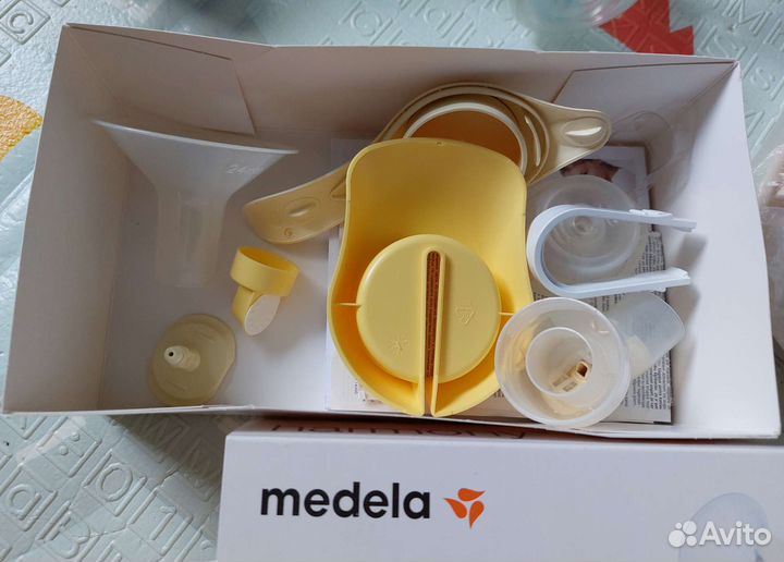 Молокоотсос электрический Medela Swing + разное