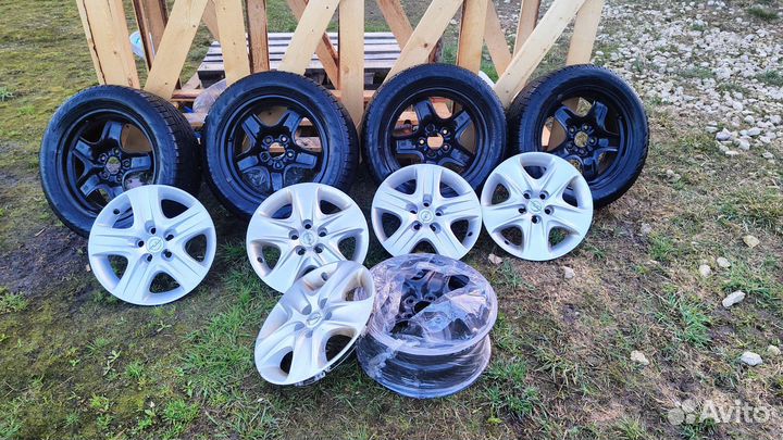 Диски Opel r16 с колпаками и резиной