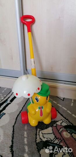 Игрушка каталка с ручкой