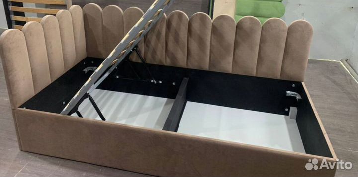 Кровать с подъемным механизмом