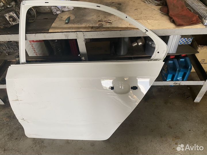 Дверь задняя левая Skoda Rapid