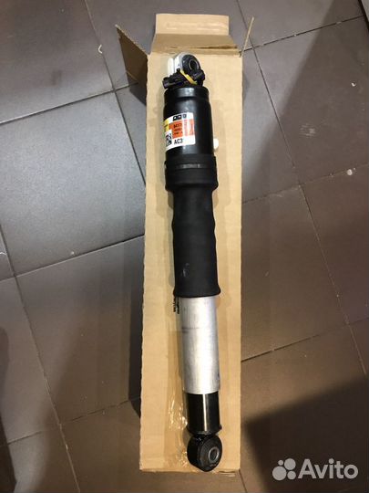 Амортизатор подвески Escalade Tahoe задний оригина