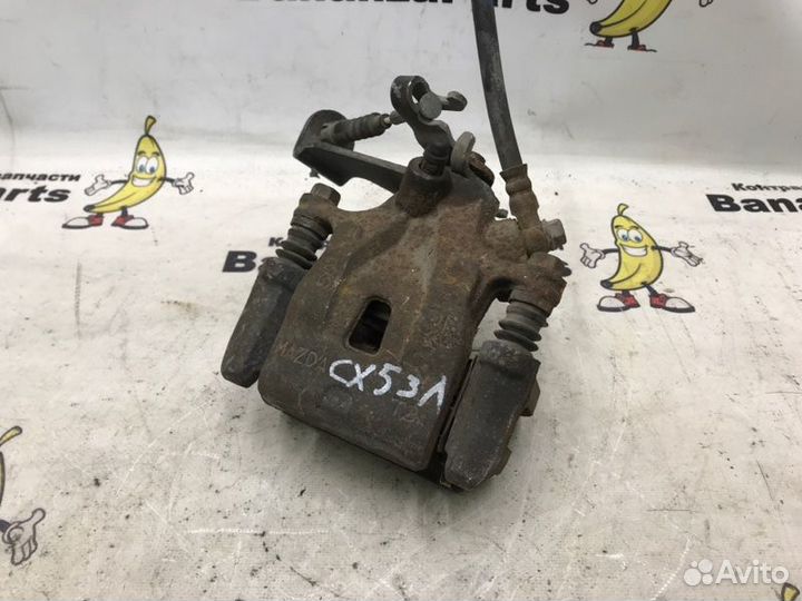 Суппорт тормозной задний левый Mazda Cx-5 KE