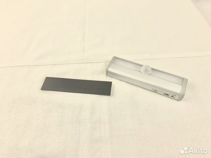 Светильник с сенсором движения и освещенности