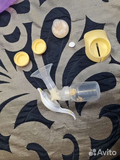 Молокоотсос medela ручной