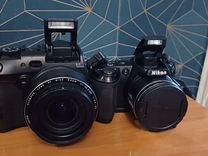 2 фотоаппарат Olympus и Nikon
