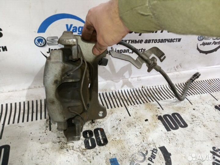 Суппорт тормозной передний правый Volkswagen
