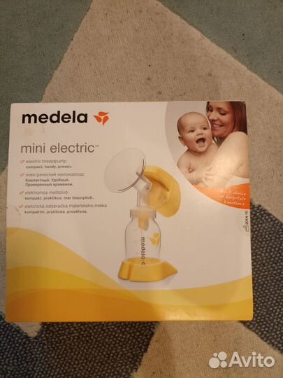 Молокоотсос medela электрический