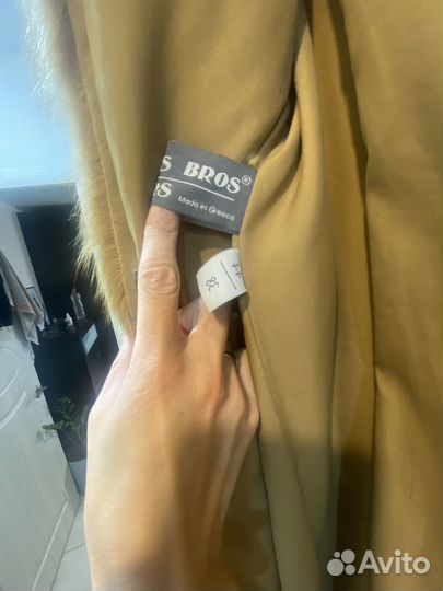 Шуба енотовая 44