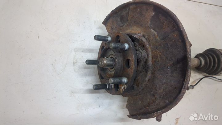 Ступица (кулак, цапфа) левая передняя SsangYong Rexton