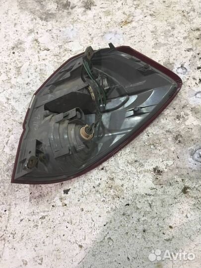 Фонарь заднего хода левый