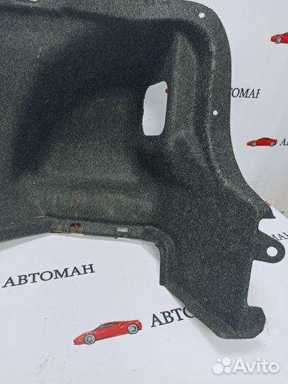 Обшивка багажника правая Toyota Corolla E150