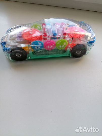 Игрушка машинка мигающая
