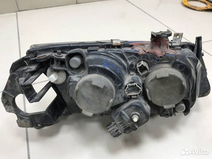 Фара левая Nissan Almera