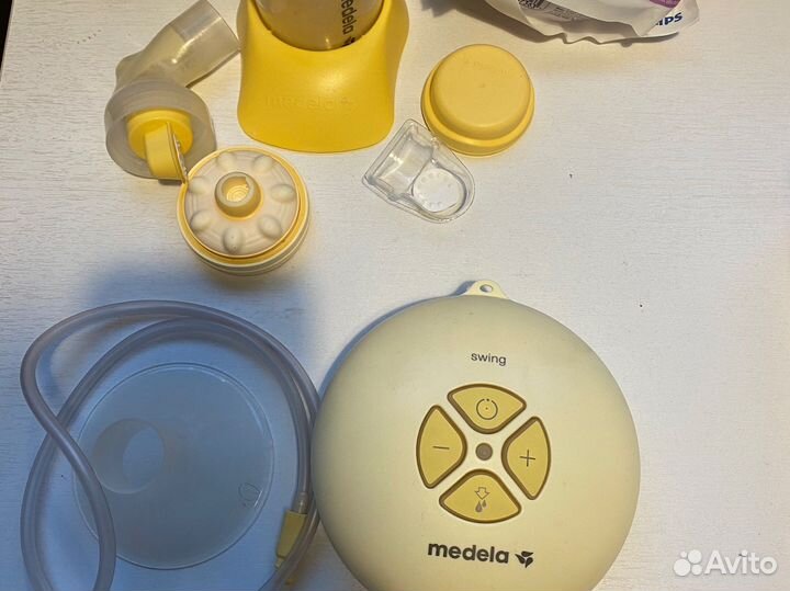 Молокоотсос medela электрический