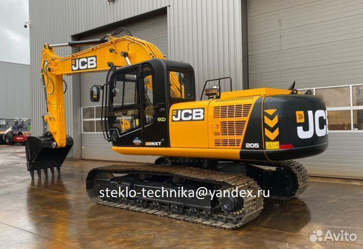 Стекло кузовное возле стрелы на JCB 205