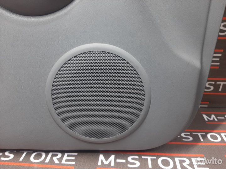 Обшивка двери передняя левая Toyota Funcargo NCP20