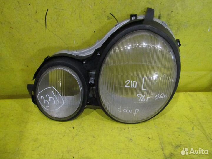 Стекло фары левое Mercedes 210 E 96-02г 331