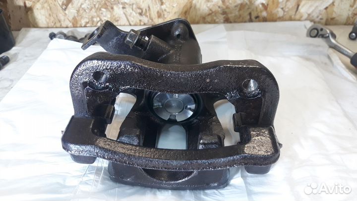 Суппорт задний правый kia rio 3