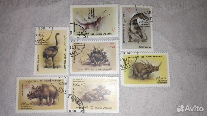 Марки серия Динозавры 7шт