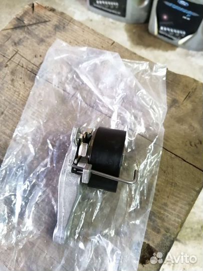 Натяжной ролик ремня грм на форд фокус 1