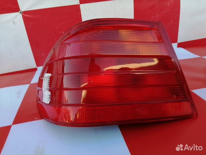 Фонарь задний левый оригинал Мерседес W210