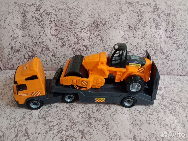 Игрушка грузовик каток